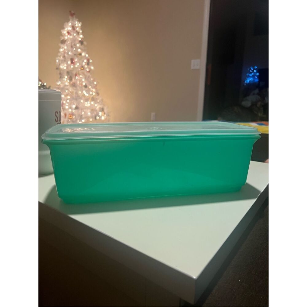 Large green Tupperware clear lid 14in long x 5in tall x 6in wide.